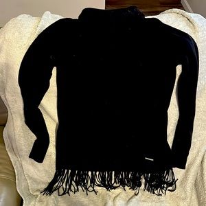 MK black knit sweater with turtle neck and fringe bottom.